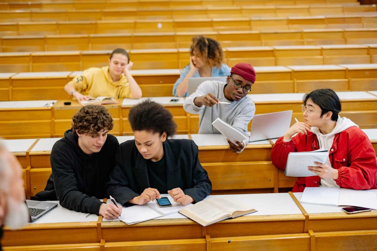 Diverse international students studying Chinese language together in a modern university classroom in China with traditional cultural decorations