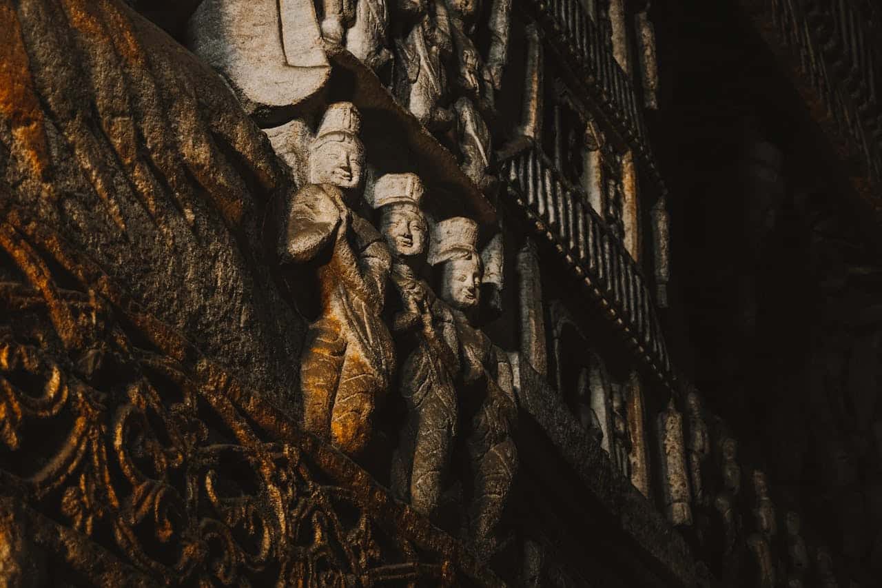 Yungang Grottoes cliff face with rows of Buddhist caves in Datong, Shanxi, China