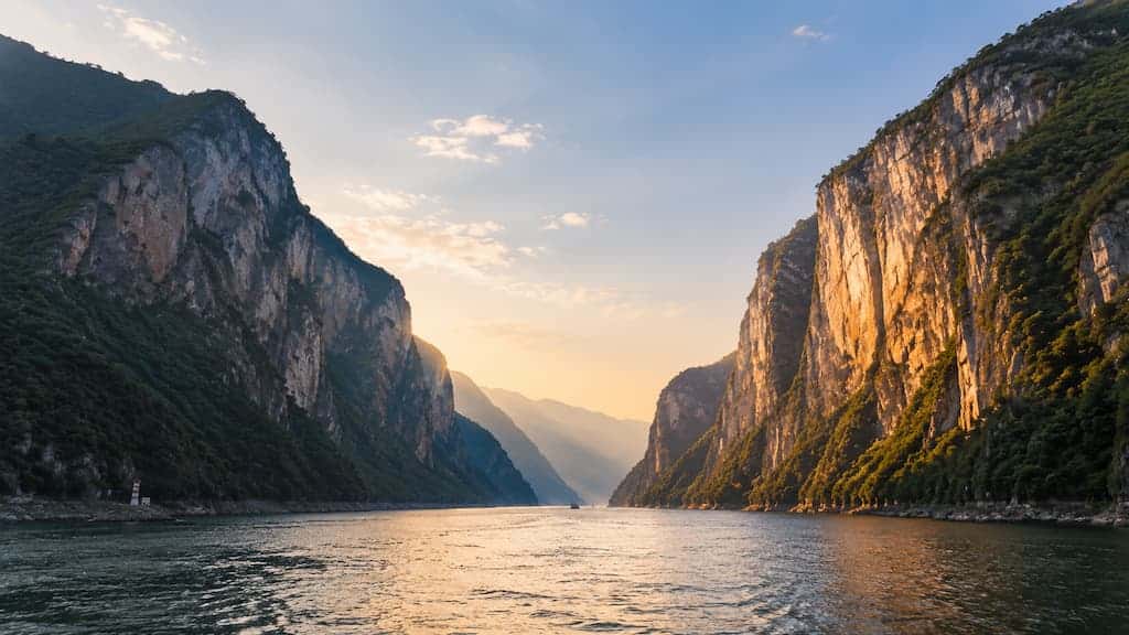 Kuimen gateway cliffs at Baidicheng & Qutang Gorge Scenic Area reflected in the Yangtze River at dawn, Fengjie Chongqing